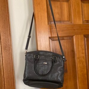 Crossbody in great shape with 3 pocket insert.